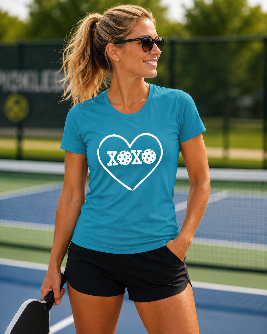 A New Pickleball Dryfit. Ladies, short sleeve, crew neck, moisture-wicking fabric, graphic tee. XOXO. Available in 9 colors.