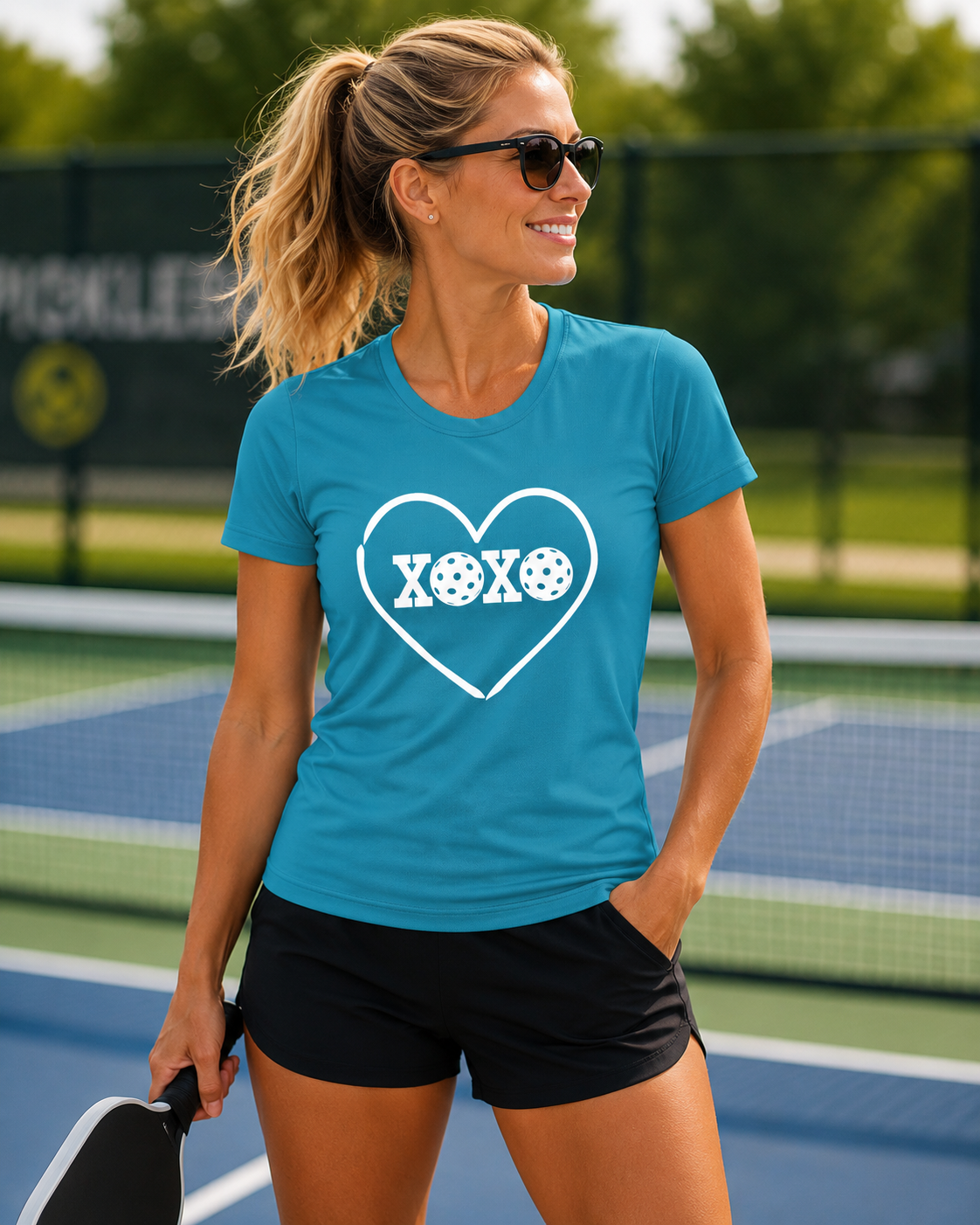 A New Pickleball Dryfit. Ladies, short sleeve, crew neck, moisture-wicking fabric, graphic tee. XOXO. Available in 9 colors.