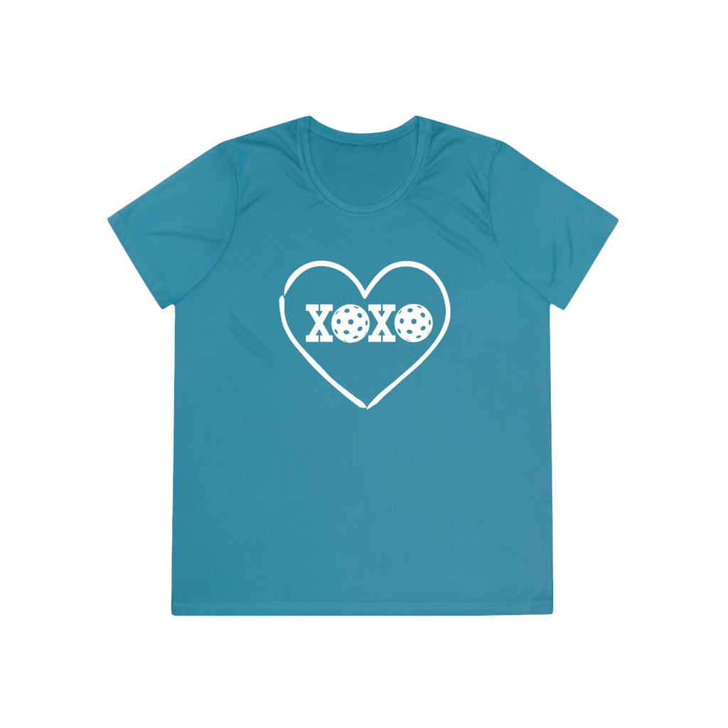 A New Pickleball Dryfit. Ladies, short sleeve, crew neck, moisture-wicking fabric, graphic tee. XOXO. Available in 9 colors.