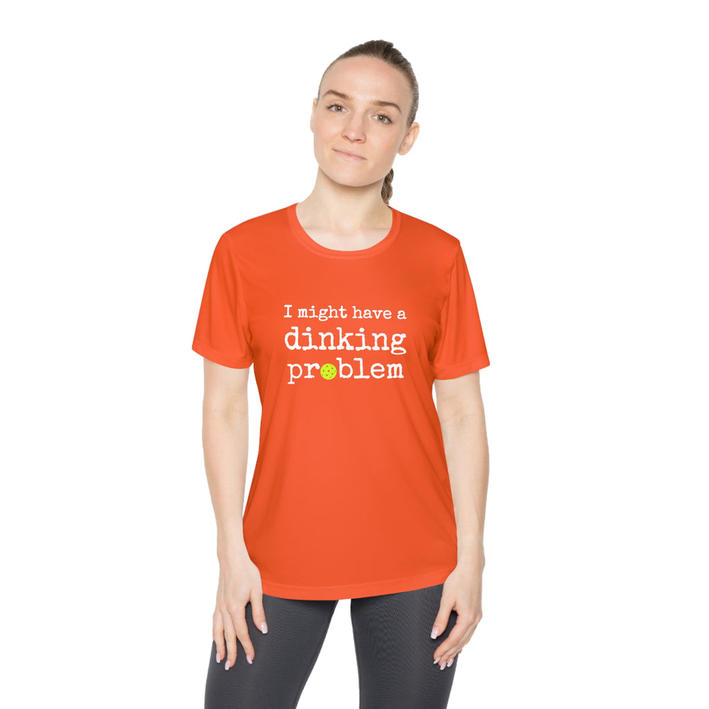 A New Pickleball Dryfit.  Ladies, short sleeve, crew neck, moisture-wicking fabric, graphic tee. I Might Have a Dinking Problem.  Available in 9 Colors.