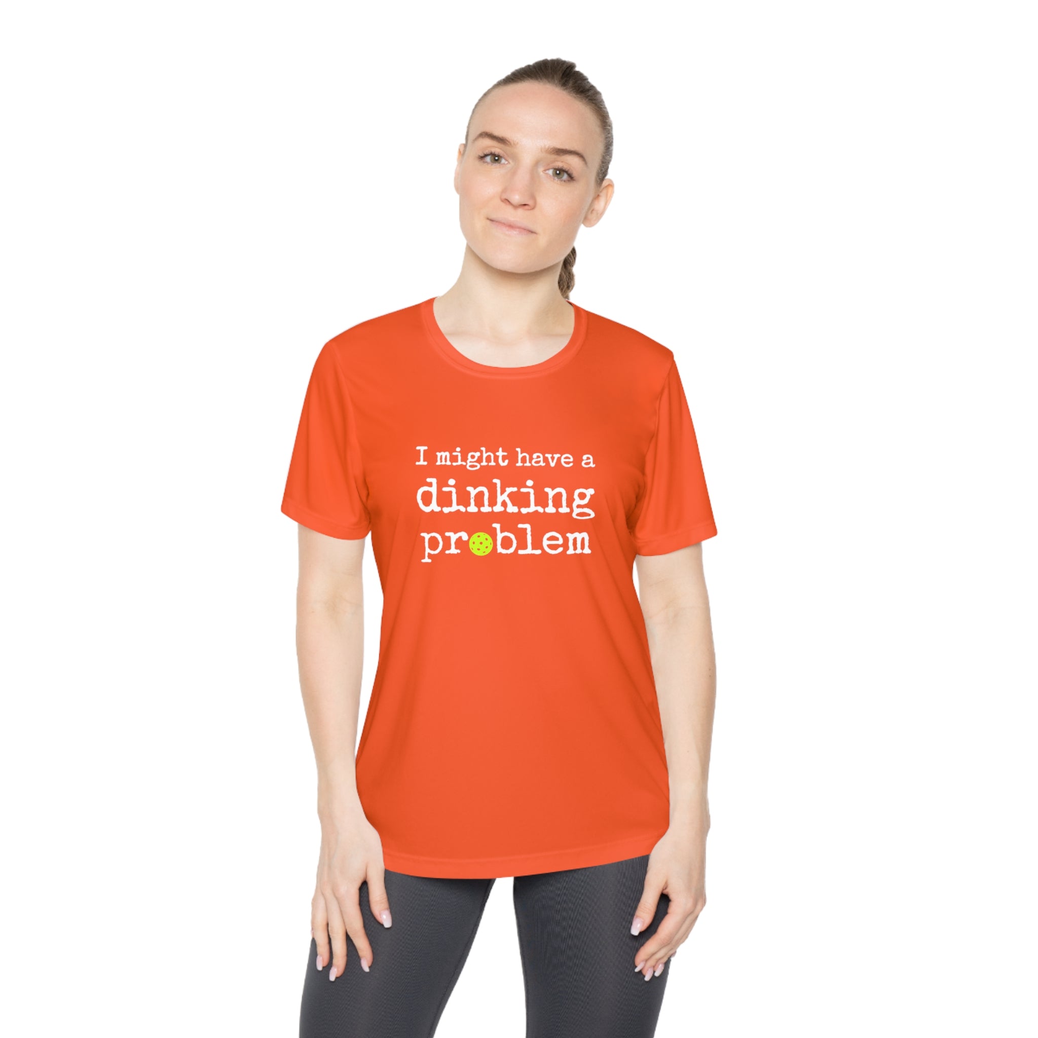A New Pickleball Dryfit.  Ladies, short sleeve, crew neck, moisture-wicking fabric, graphic tee. I Might Have a Dinking Problem.  Available in 9 Colors.